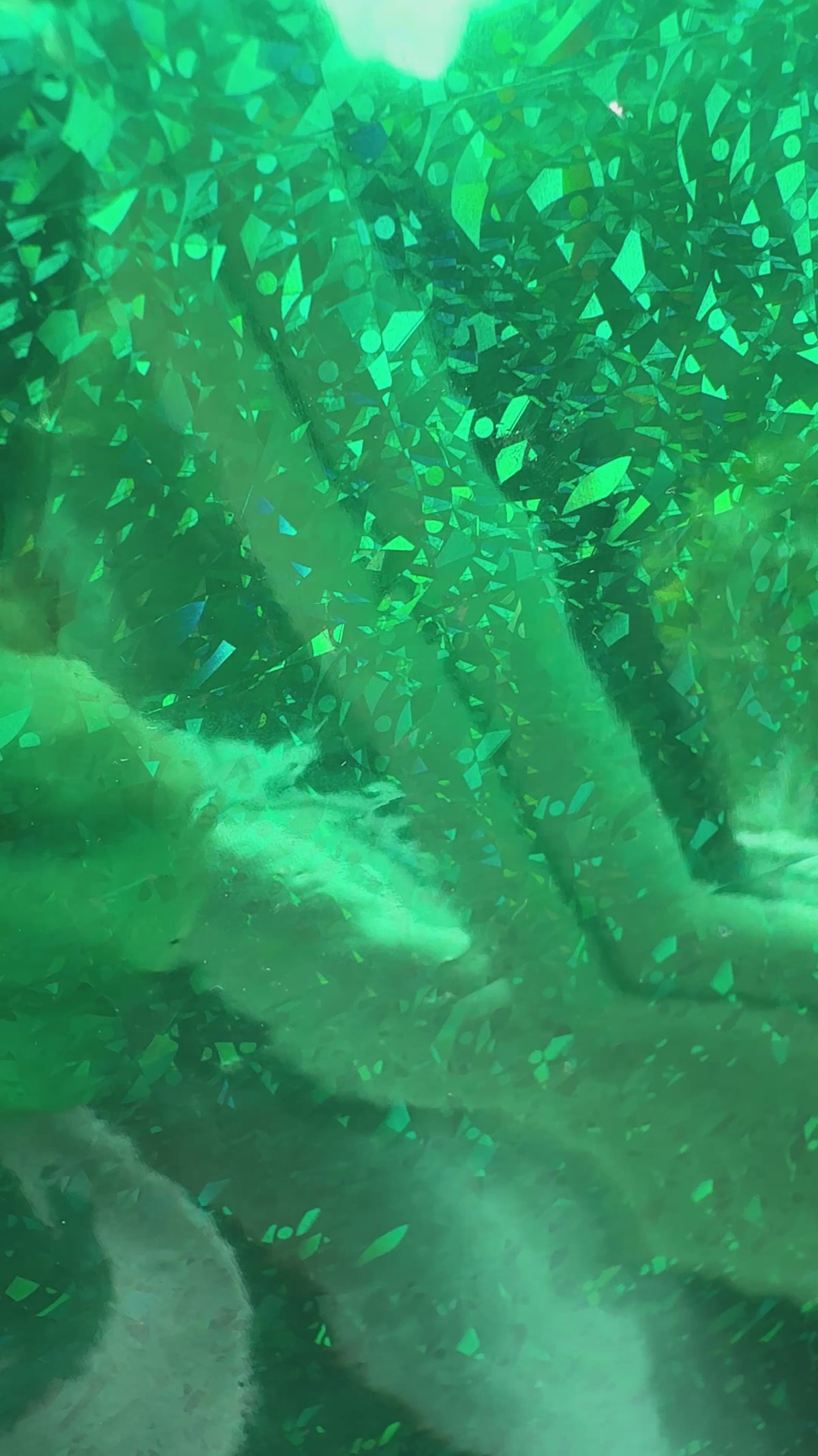 Emerald City green crackle holographic toner reactive foil moving in the light, shattered green facets flashing